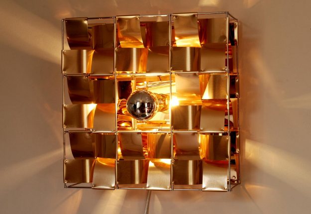 Atlas applique cuivre