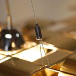 Détail Tchouri suspension or